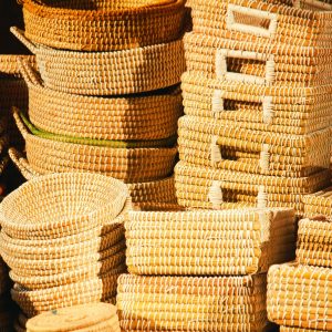 Bulk handwoven rattan storage baskets for export - Wholesale supply of natural woven baskets for international importers and home decor retailers