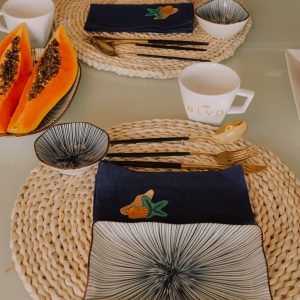 Bulk rattan and bamboo woven bags and placemats for export - Wholesale supply of natural eco-friendly tableware sets and fashion accessories for international importers