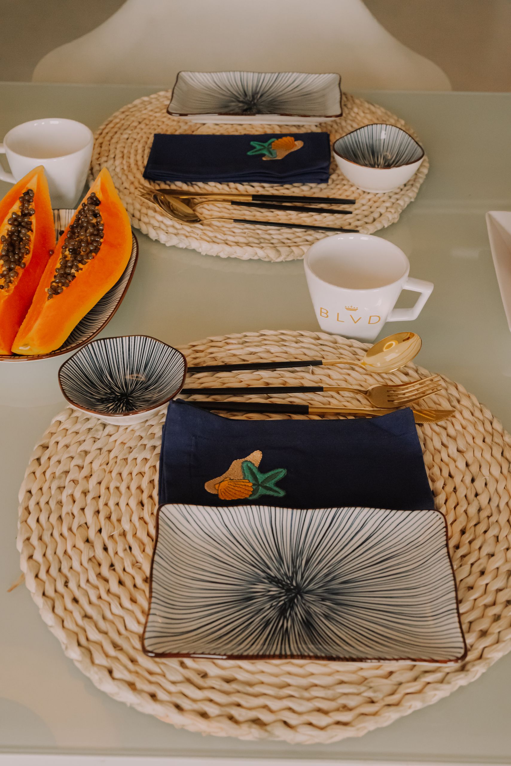 Bulk rattan and bamboo woven bags and placemats for export - Wholesale supply of natural eco-friendly tableware sets and fashion accessories for international importers